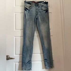 Distressed Blue Moto Jeans with Zipper Accents - Trendy & Bold!